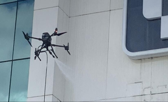 LAVAGEM DE FACHADA COM DRONE